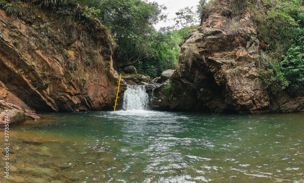 a beautiful river between the rocks, charco escondido jamundí, Colombia