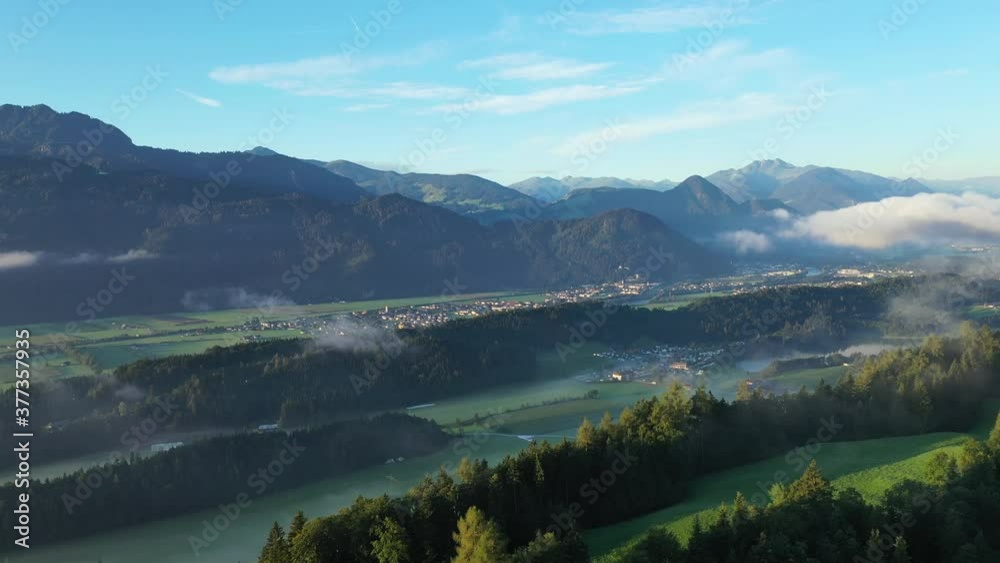 Drone flight over Tyrol landscape, at sunrise in Austria Drone flight over Tyrol landscape, at sunrise in Austria