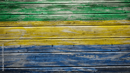 Gabon flag painted on weathered wood planks