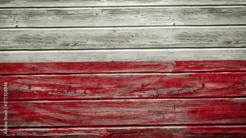 Poland flag painted on weathered wood planks
