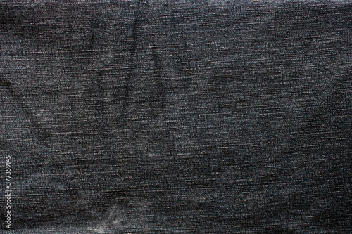 close-up on black jeans fabric