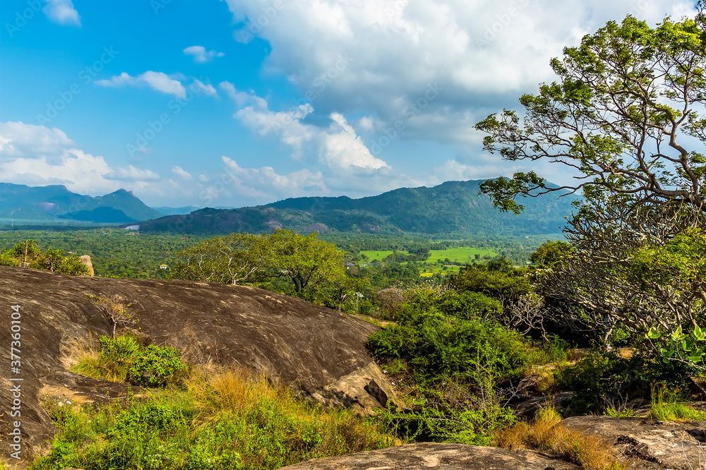 A view from the entrance to cave temples at Dambulla, Sri Lanka over the surrounding countryside