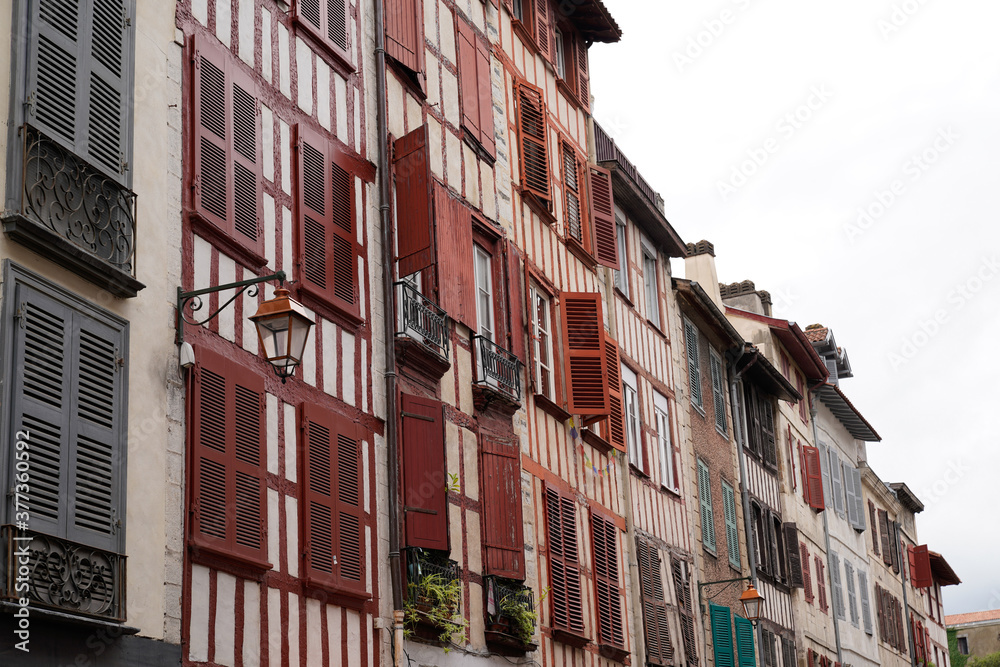 Old typical buildings in bask Bayonne city in ancient basque country in France Aquitaine