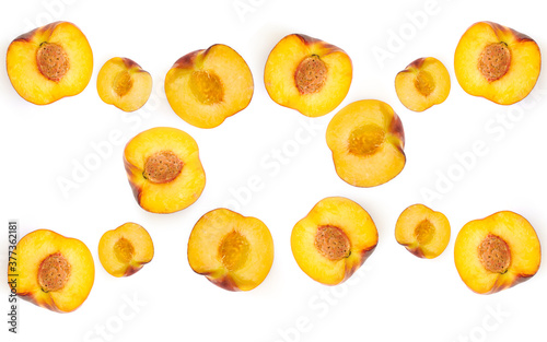 Top view of fresh organic peaches fruit isolated on a white background. Tropical abstract background. Peach pattern. Flat lay composition.