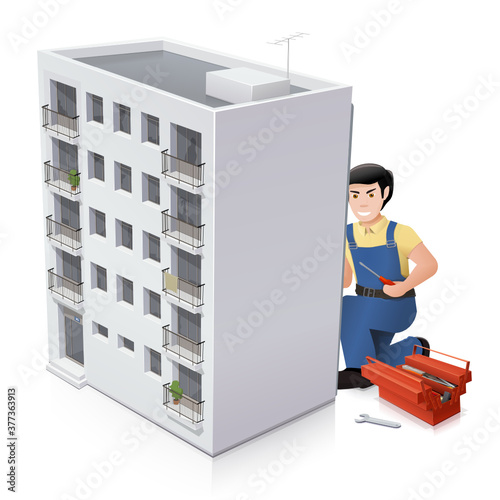 Technicien de copropriété faisant des réparations dans l'immeuble