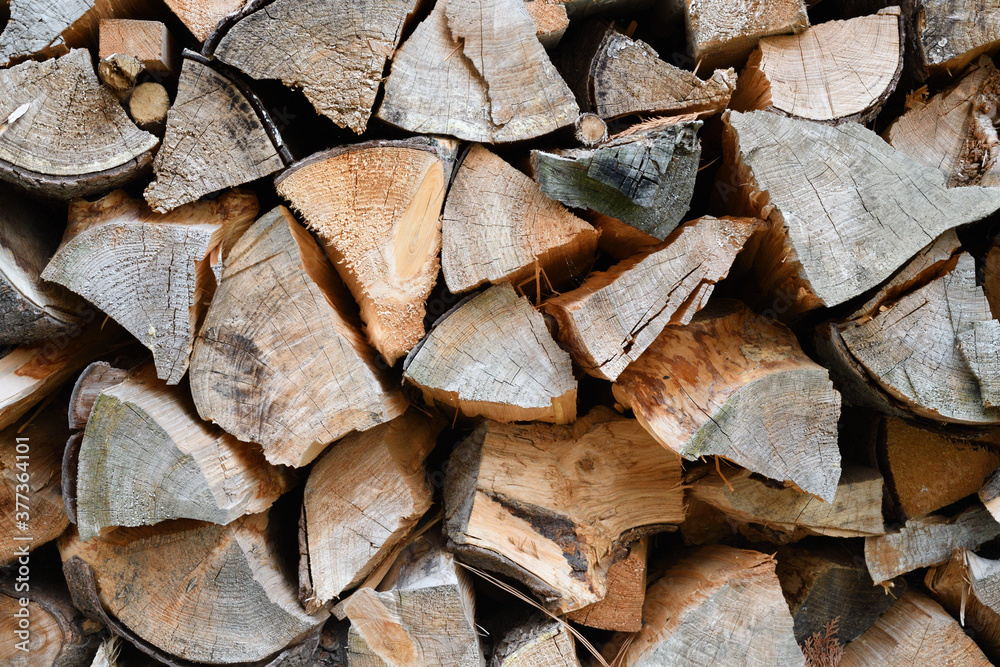 Chopped firewood for the fireplace, background. Chopped firewood for the fireplace, background.