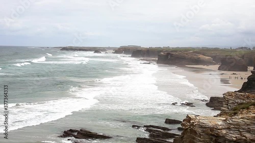 Massive panoramic vies to a stunning beach in Ribadeo, spain, playa de las catedrales, during a cloudy day