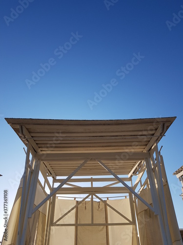 Wallpaper Mural Sunshade on the beach in the form of a Bungalow Torontodigital.ca