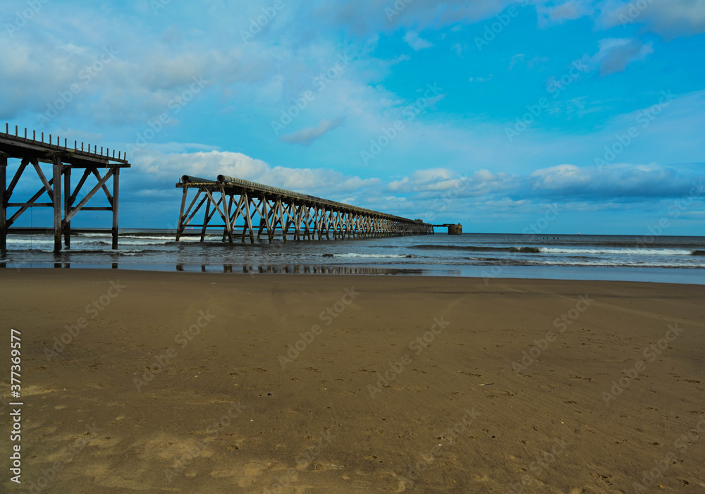 Steetley Pier Hartlepool against a blue sky