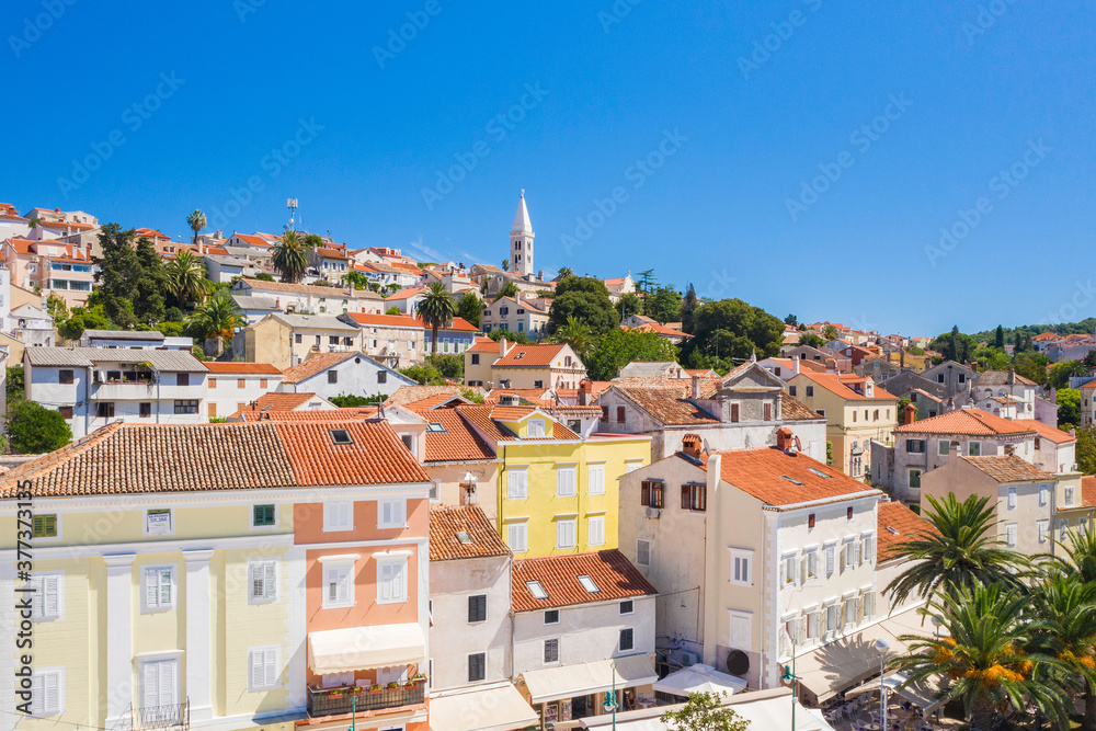 Beautiful town of Mali Losinj on the island of Losinj, Croatia, cathedral and city center from drone