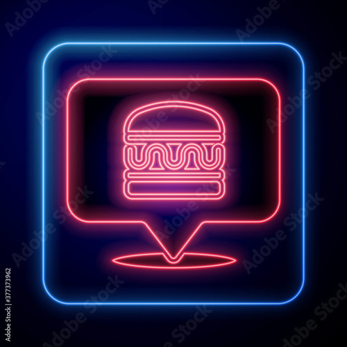 Glowing neon Online ordering and burger delivery icon isolated on blue background. Vector.