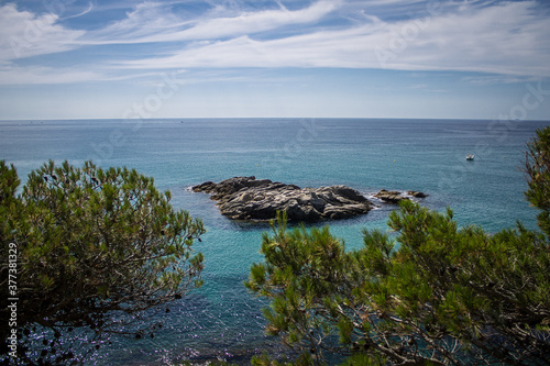 Sea and Nature with a Blue Sky from the Coastline.  © Xènia