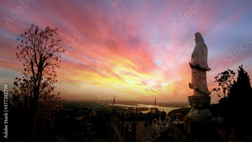 Bodhisattva standing on the mountain looking down into the valley