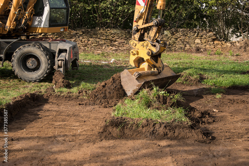 demarcation of a new building on topsoil before the construction of a family house begins photo