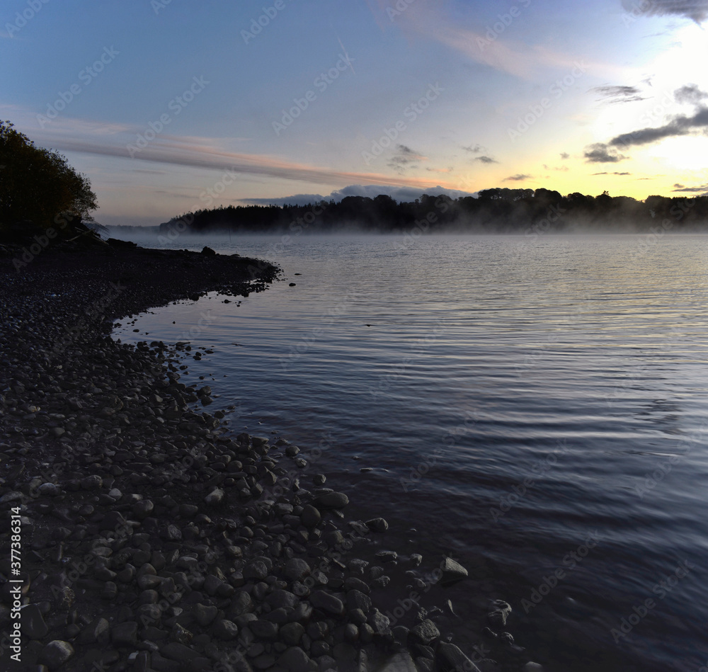 Fototapeta premium Beautiful Sunrise Over Foggy Lake, Ireland