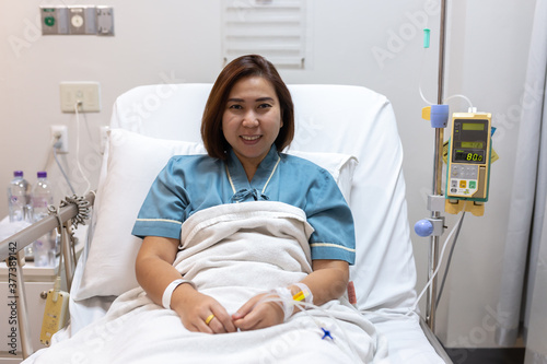 asian patient woman  in bed photo