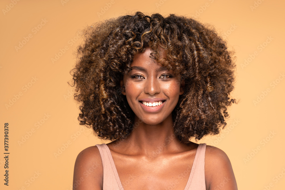 Happy african american woman smiling.