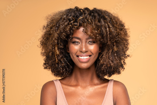 Happy african american woman smiling.