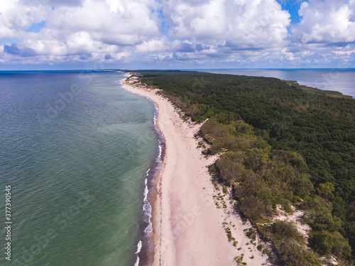 Beautiful aerial drone wide view of Curonian spit  Kurshskaya Kosa National Park  Curonian Lagoon and the Baltic Sea   Kaliningrad Oblast  Russia and Klaipeda County  Lithuania  summer sunny day