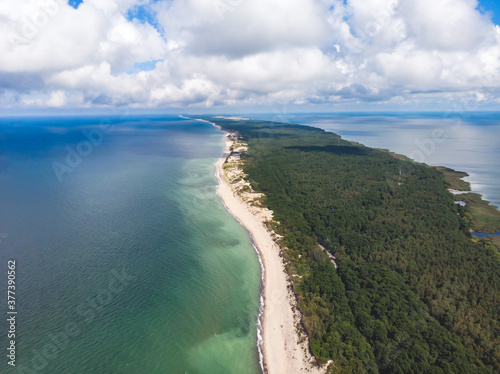 Beautiful aerial drone wide view of Curonian spit, Kurshskaya Kosa National Park, Curonian Lagoon and the Baltic Sea,  Kaliningrad Oblast, Russia and Klaipeda County, Lithuania, summer sunny day photo