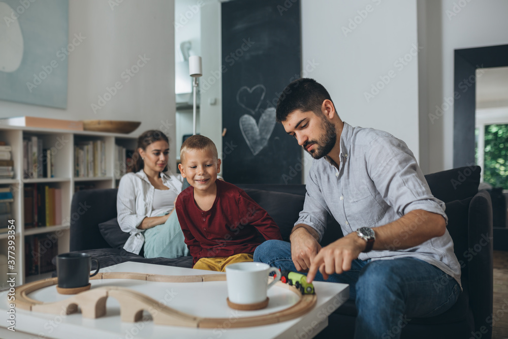 cute young family spending time together at home cute young family spending time together at home