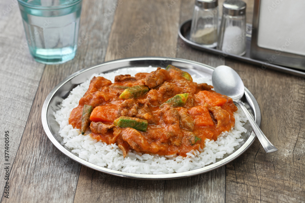 senegalese peanut stew called mafe. senegalese peanut stew called mafe.