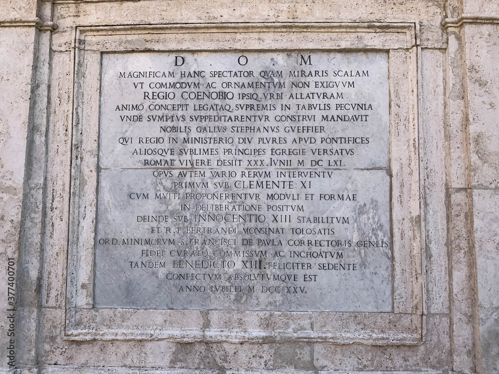 Plate with a Latin historical inscription at the Spanish steps - Scalinata di Trinità dei Monti