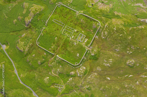 Aerial of Hardknott Roman Fort is an archeological site, the remains of the Roman fort Mediobogdum, located on the western side of the Hardknott Pass in the English county of Cumbria
