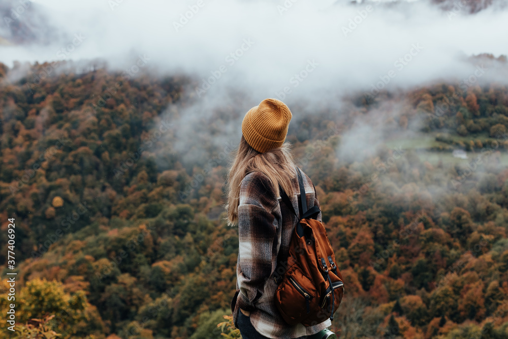 woman traveling and exploring nature on an autumn day. woman traveling and exploring nature on an autumn day.