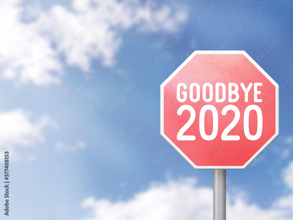 Goodbye 2020 Road sign on blue sky background Goodbye 2020 Road sign on blue sky background