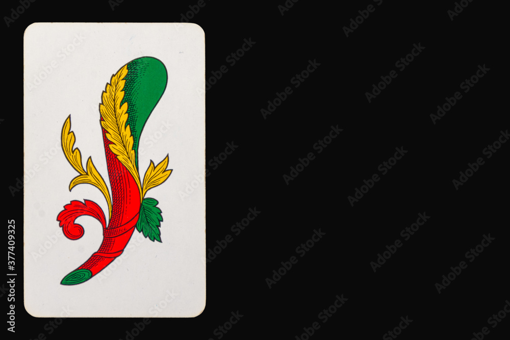 Ace of stick of the Neapolitan playing cards on a black background