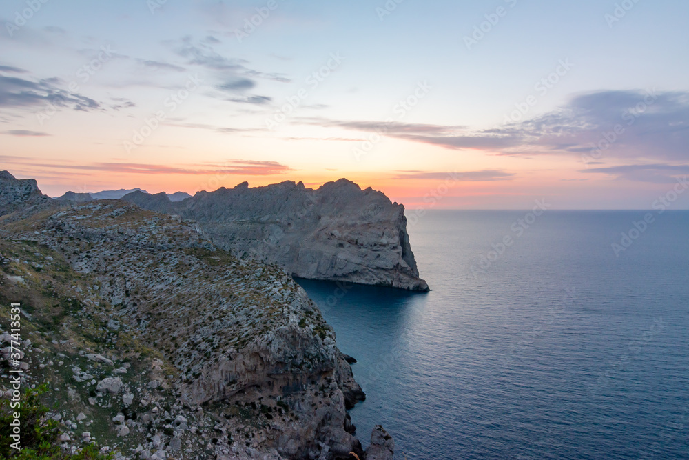 Sunset at sea from Formentor cape, Mallorca island, Spain