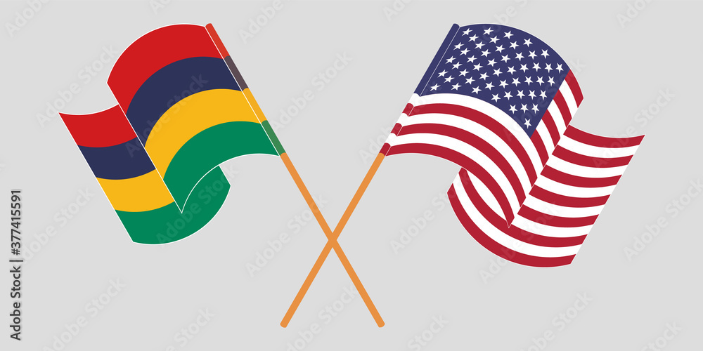Crossed and waving flags of Mauritius and the USA Crossed and waving flags of Mauritius and the USA