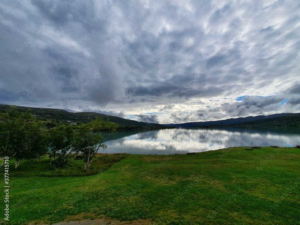 reflection of the sky and clouds in the water - Hardangervidda