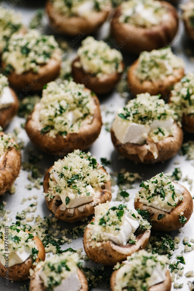 Brie stuffed mushrooms ready to be cooked Brie stuffed mushrooms ready to be cooked
