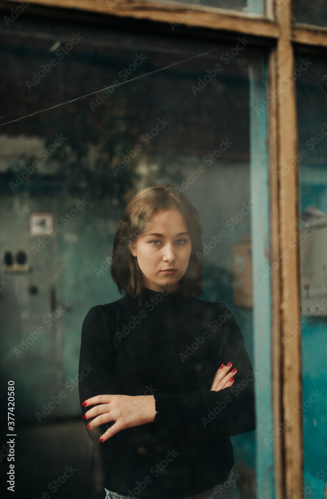 young woman inside a old house young woman inside a old house