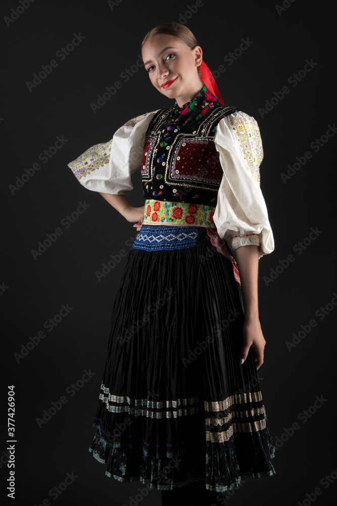 Beautiful woman wearing traditional Eastern Europe folk costumes. Slovak folk costumes.