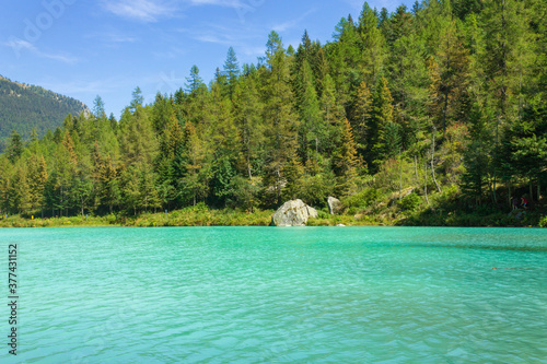 Lake of fairies (Lago delle Fate in Italian) in Macugnaga, Italy against mountains. It is famous for its clear and green water.