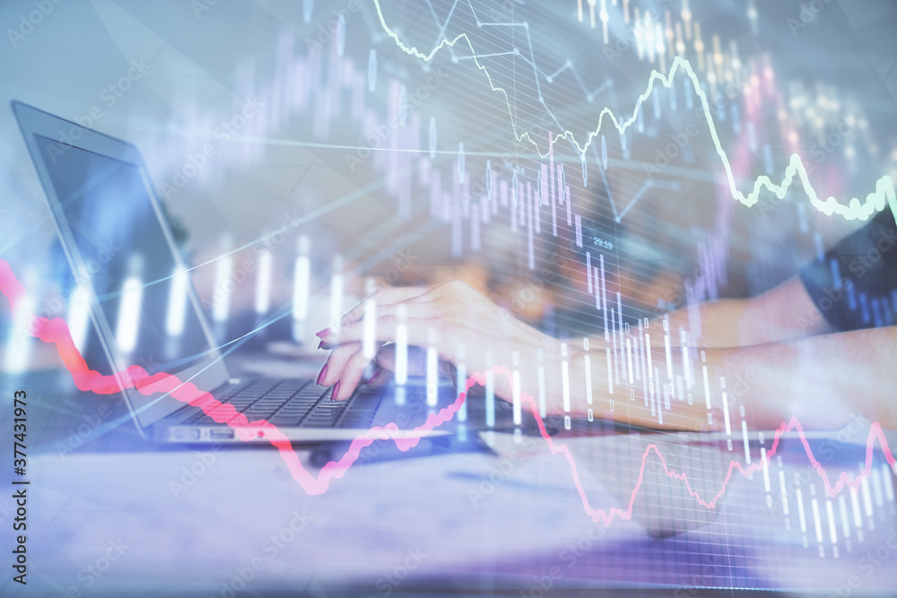 Double exposure of businesswoman hands typing on computer and forex chart hologram drawing. Financial analysis concept. Double exposure of businesswoman hands typing on computer and forex chart hologram drawing. Financial analysis concept.