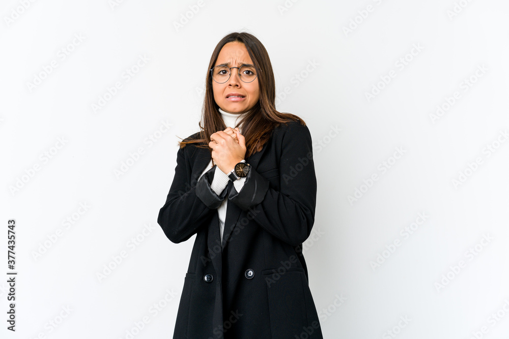 Young mixed race business woman isolated on white background scared and afraid. Young mixed race business woman isolated on white background scared and afraid.