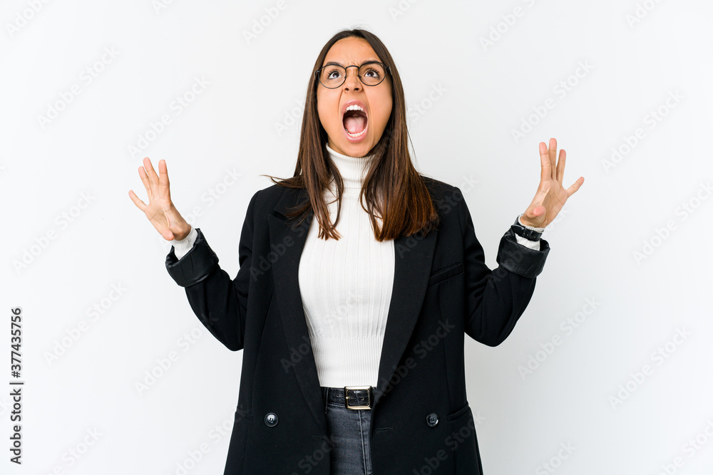 Young mixed race business woman isolated on white background screaming to the sky, looking up, frustrated. Young mixed race business woman isolated on white background screaming to the sky, looking up, frustrated.