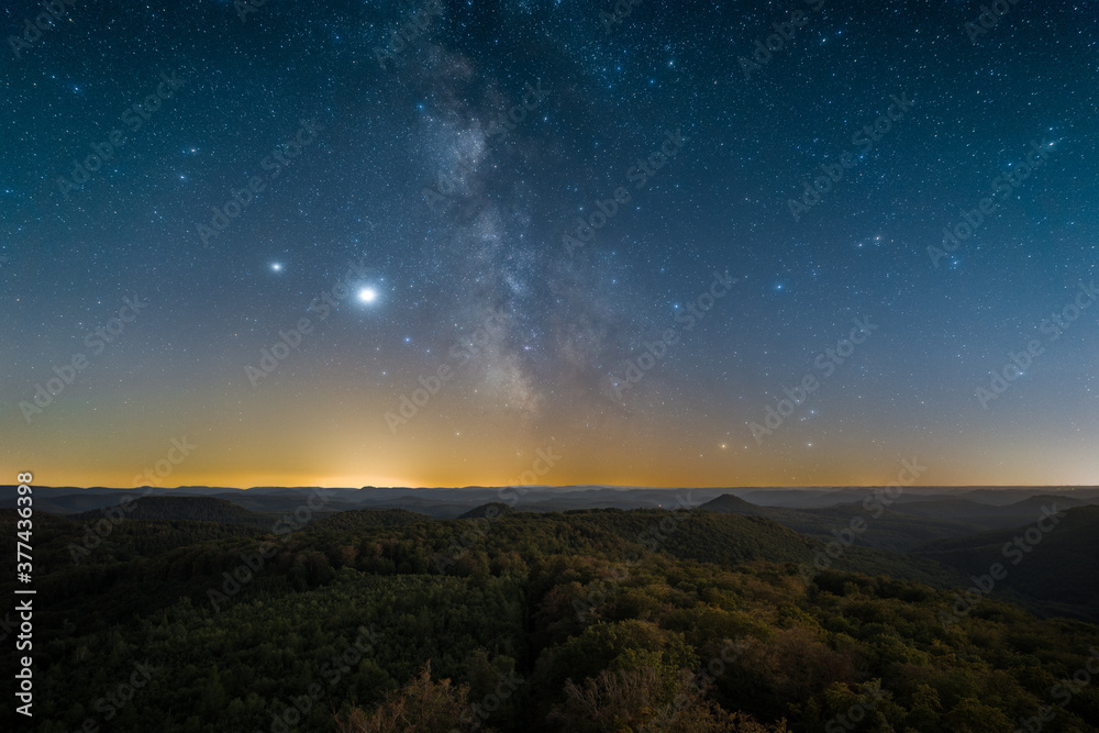 The Palatinate Forest in Germany at night as seen from the Luitpold Tower.