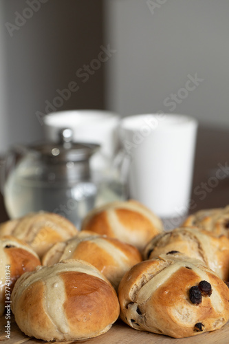 homemade hot cross buns on the table ready for smoko photo