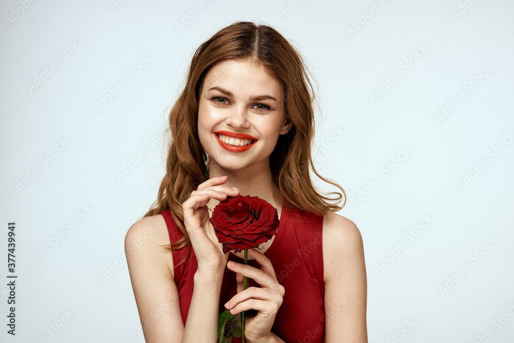 Pretty woman with rose in her hands charm gift lifestyle studio light background Pretty woman with rose in her hands charm gift lifestyle studio light background