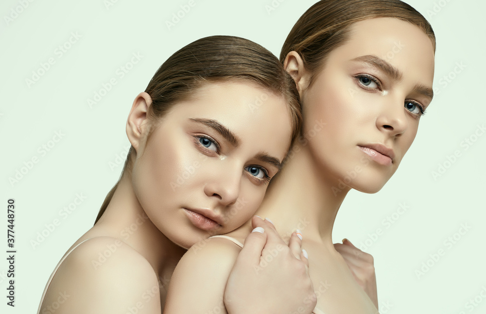 Two beautiful sensual young girls with clean fresh face skin Two beautiful sensual young girls with clean fresh face skin