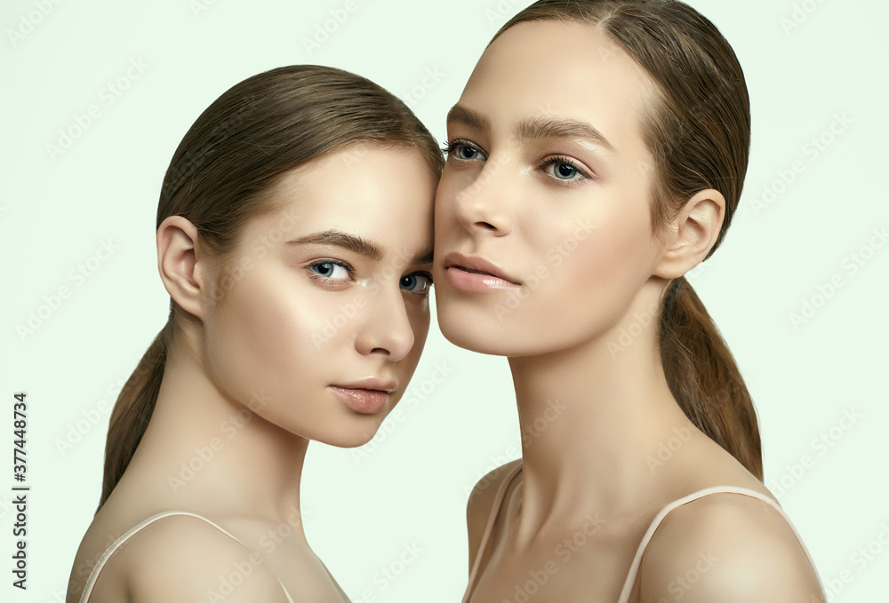 Two beautiful sensual young girls with clean fresh face skin Two beautiful sensual young girls with clean fresh face skin