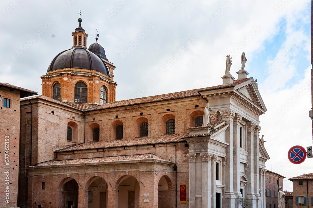 View of the facade and the cupola of the neoclassical Duomo di Urbino, Urbino Cathedral in the Marche, Italy.