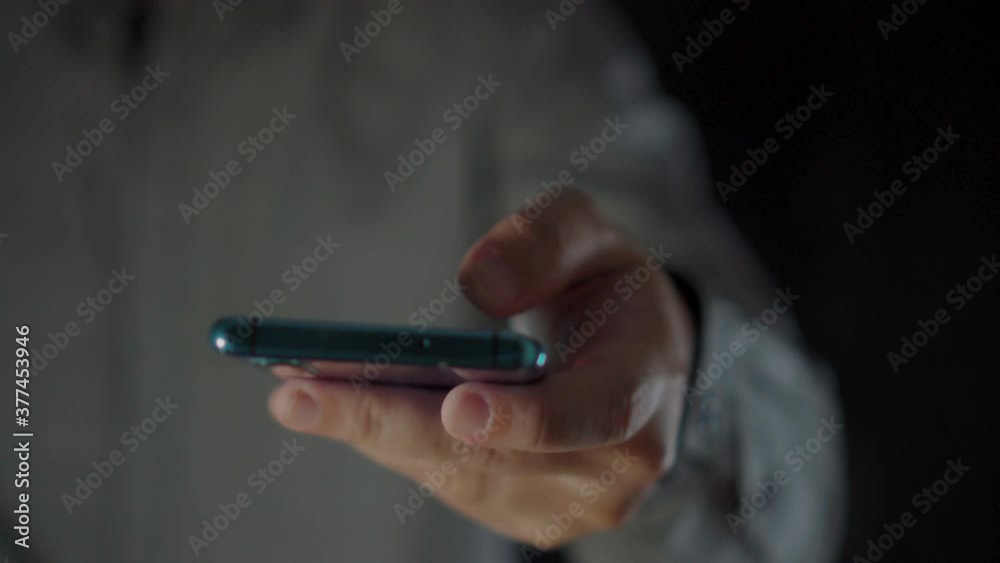4K Video close up man hand with mobile phone. Concept for cellphone technology and touchscreen 4K Video close up man hand with mobile phone. Concept for cellphone technology and touchscreen