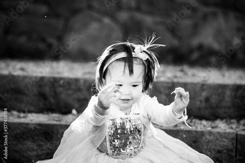 girl in the autumn park on blue dress