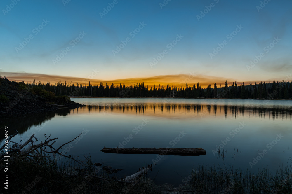 Fire-red sky from distant wildfires in Oregon at Sparks Lake, Bend